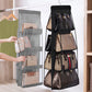 Handbag organizer with multiple compartments holding various handbags.